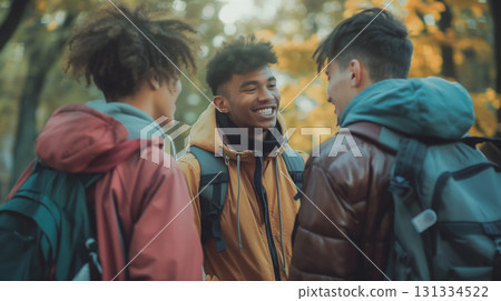 Friends laughing together in autumn scenery. 131334522