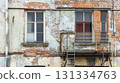 Dilapidated building with old windows. 131334763