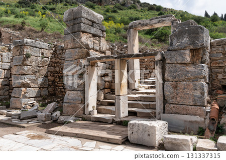 Ancient stone doorway and steps at the archaeological site of Ephesus, Selcuk, Turkey. Ancient stone doorway and steps at the archaeological site of Ephesus, Selcuk, Turkey. 131337315