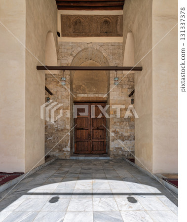 Mamluk architecture: Historic entrance and wooden door of Mosque of al-Zahir Baybars, Cairo, Egypt 131337378