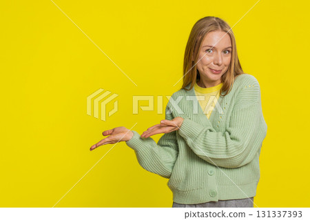 Woman raising hands asking what why reason of failure demonstrating disbelief irritation by troubles Woman raising hands asking what why reason of failure demonstrating disbelief irritation by troubles 131337393