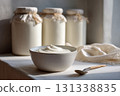 Bowl of creamy homemade yogurt placed on a linen cloth 131338835
