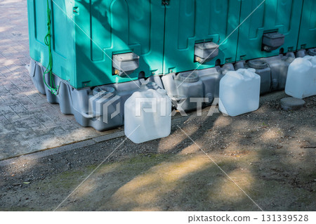 Backside of the temporary toilet delivered to the event venue Backside of the temporary toilet delivered to the event venue 131339528