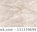 Elegant cream marble surface with subtle veining patterns in natural light 131339699