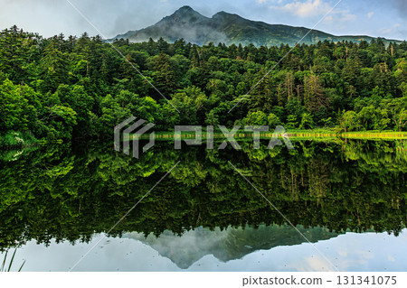 The majestic Rishiri Fuji reflected in Hime-numa Pond on Rishiri Island The majestic Rishiri Fuji reflected in Hime-numa Pond on Rishiri Island 131341075