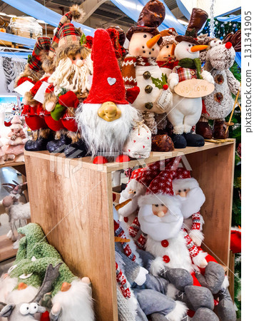 Christmas and New Year's toys on a shelf in a store. Festive winter Christmas trade 131341905