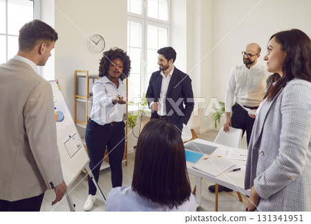 Business people discussing company growth on a conference in meeting room in office. 131341951