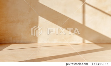 Sunlight is creating shadows on a beige wall and floor, offering a minimalist and elegant setting, ideal for showcasing products or designs in a mockup presentation Sunlight is creating shadows on a beige wall and floor, offering a minimalist and elegant setting, ideal for showcasing products or designs in a mockup presentation 131343163