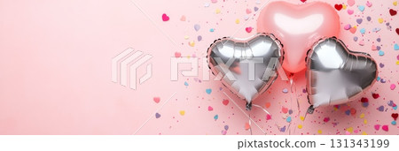 Heart shaped pink and silver balloons floating against a pastel pink backdrop, decorated with colorful confetti, create a cheerful atmosphere for love celebrations Heart shaped pink and silver balloons floating against a pastel pink backdrop, decorated with colorful confetti, create a cheerful atmosphere for love celebrations 131343199
