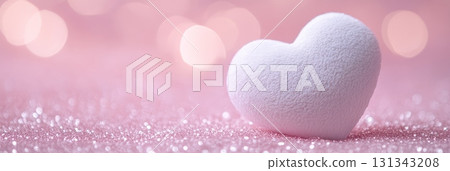 White heart resting on a sparkly pink glitter background, surrounded by shimmering bokeh, evokes feelings of love and romance, perfect for valentine's day or anniversaries 131343208