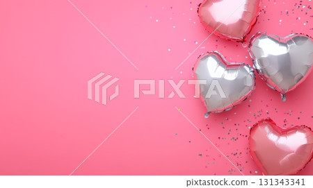 Heart shaped balloons in pink and silver floating on a pink background with confetti create a festive atmosphere, perfect for valentine's day, anniversaries, or romantic celebrations 131343341