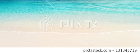 Soft waves gently lapping the shore of a pristine white sand beach create a serene and idyllic tropical paradise, perfect for a relaxing summer getaway Soft waves gently lapping the shore of a pristine white sand beach create a serene and idyllic tropical paradise, perfect for a relaxing summer getaway 131343719