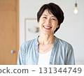 A portrait of a Japanese middle-aged woman (in her 50s) with a natural smile, giving a refreshing and healthy impression 131344749