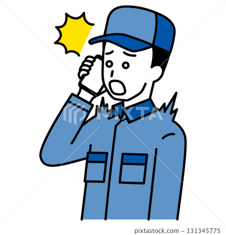 A man in overalls is surprised by a call on his smartphone 131345775