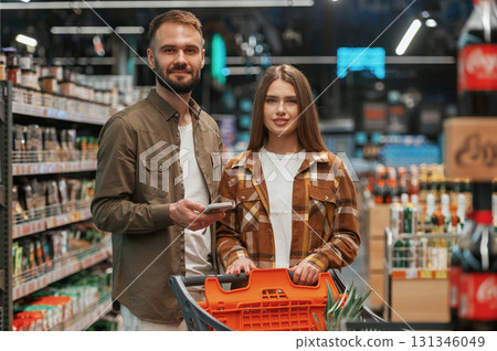 Beautiful people. Young couple are in supermarket together 131346049