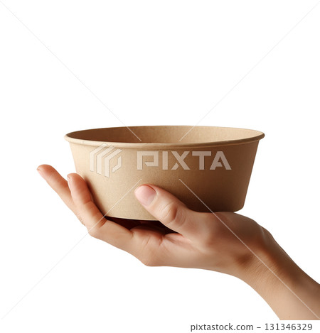Hand holding a mockup empty large brown takeaway paper bowl, isolated on a transparent background. 131346329