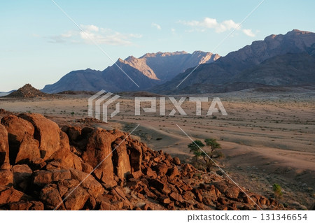 Mountains at evening time. Majestic view of amazing landscapes in African desert Mountains at evening time. Majestic view of amazing landscapes in African desert 131346654