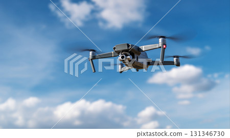 Unidentified drones flying in the sky, raising concerns of privacy and security surveillance 131346730