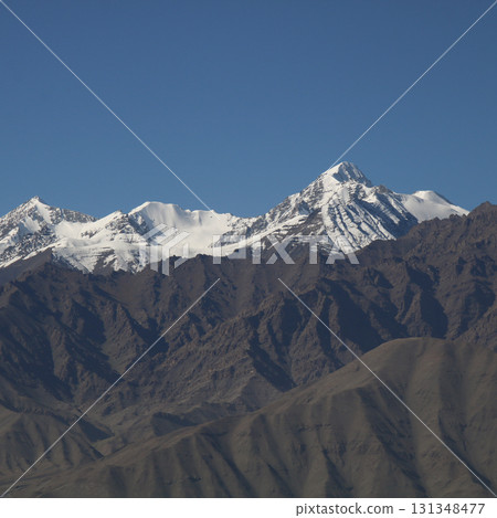 Snow capped mountain in Ladak, seen from Leh, India. 131348477