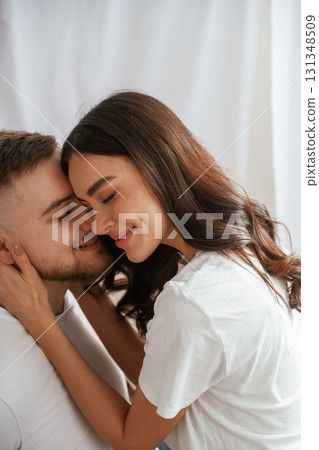 Closeness of the people. Young couple are together at home Closeness of the people. Young couple are together at home 131348509