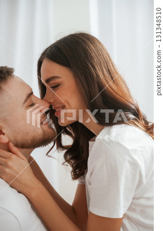 Closeness of the people. Young couple are together at home Closeness of the people. Young couple are together at home 131348510