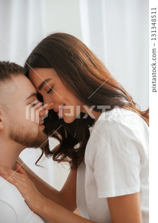 Closeness of the people. Young couple are together at home Closeness of the people. Young couple are together at home 131348511