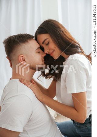 Closeness of the people. Young couple are together at home Closeness of the people. Young couple are together at home 131348512
