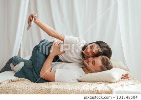 Photo for social media. Young couple are together at home Photo for social media. Young couple are together at home 131348594