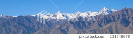 Snow capped mountain range seen from Leh, India. 131348678