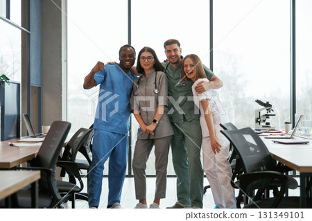 Front view. Group of doctors are together indoors Front view. Group of doctors are together indoors 131349101