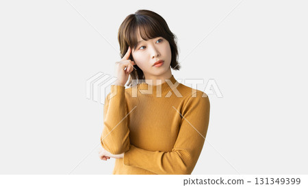 A woman thinking A woman thinking 131349399