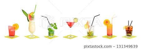 Seven classic cocktails in a row. Famous and popular alcoholic beverages in fancy glasses. From left to right Americano, Pina colada, Mojito, Cosmopolitan, Caipirinha, Tequila sunrise, and Cuba libre. 131349639
