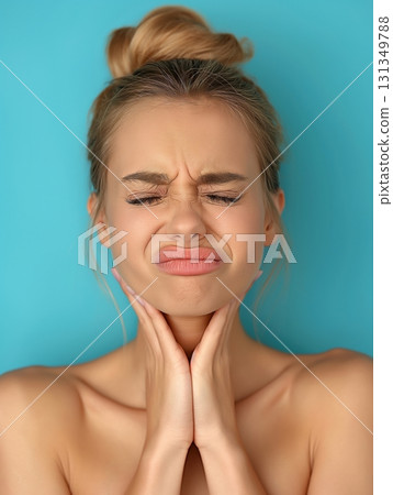 A woman with her hands clasped behind her back 131349788