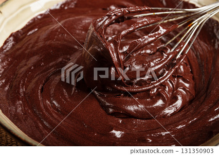 a bowl of chocolate dough, a whisk for whipping, baking, structure and consistency, homemade, top view, no people, a bowl of chocolate dough, a whisk for whipping, baking, structure and consistency, homemade, top view, no people, 131350903