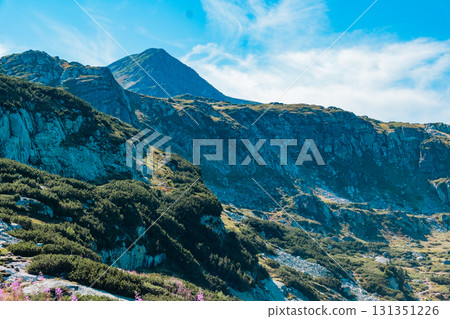 Mountain view of the Rila Mountains in Bulgaria. Seven Rila Lake hike. Eco trails. Connection with nature. Mountain view of the Rila Mountains in Bulgaria. Seven Rila Lake hike. Eco trails. Connection with nature. 131351226