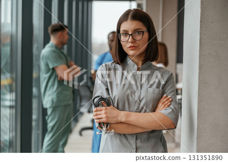 Near the windows. Group of doctors are together indoors Near the windows. Group of doctors are together indoors 131351890