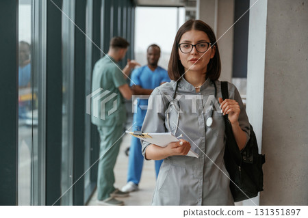 Near the windows. Group of doctors are together indoors Near the windows. Group of doctors are together indoors 131351897