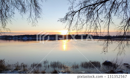 River surrounded by frost and snow. 131352567