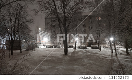 Snow-covered street with urban architecture in Riga. 131352573