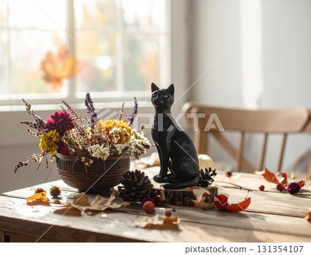 A lively autumn black cat display 131354107