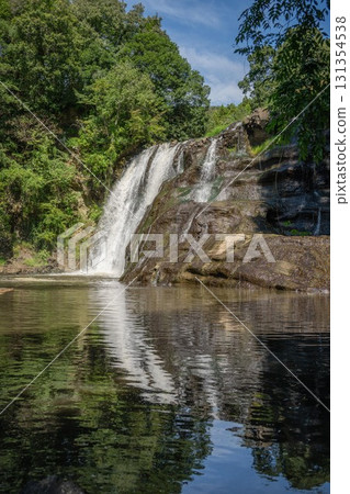 Fresh green dragon gate waterfall 131354538
