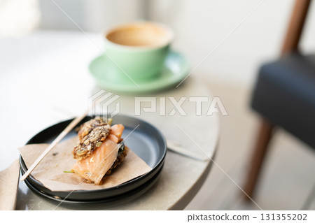 Open sandwich with smoked salmon served on plate 131355202