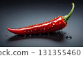 Vibrant red chili pepper rests on a slick, dark background, showcasing fresh cooking ingredient. Glossy texture and dramatic lighting evoke freshness, spice, and bold culinary appeal Vibrant red chili pepper rests on a slick, dark background, showcasing fresh cooking ingredient. Glossy texture and dramatic lighting evoke freshness, spice, and bold culinary appeal 131355460