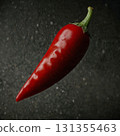 Vibrant red chili pepper rests on a slick, dark background, showcasing fresh cooking ingredient. Glossy texture and dramatic lighting evoke freshness, spice, and bold culinary appeal Vibrant red chili pepper rests on a slick, dark background, showcasing fresh cooking ingredient. Glossy texture and dramatic lighting evoke freshness, spice, and bold culinary appeal 131355463