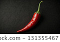 Vibrant red chili pepper rests on a slick, dark background, showcasing fresh cooking ingredient. Glossy texture and dramatic lighting evoke freshness, spice, and bold culinary appeal Vibrant red chili pepper rests on a slick, dark background, showcasing fresh cooking ingredient. Glossy texture and dramatic lighting evoke freshness, spice, and bold culinary appeal 131355467