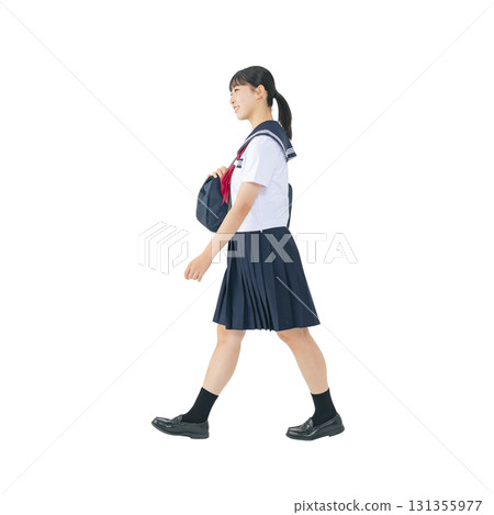 A female student wearing a sailor uniform walking. A transparent, hand-cut, full-body photo (PNG) 131355977