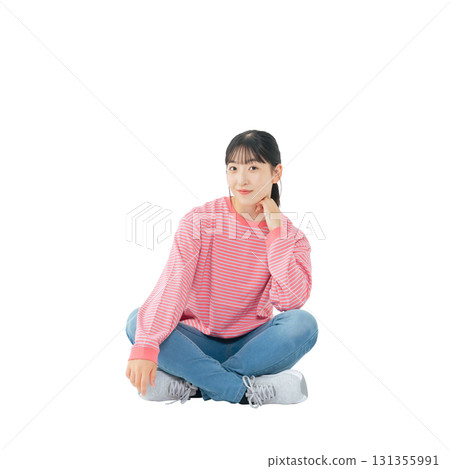 A teenage girl in casual clothing sitting down. A transparent, hand-cut, full-body PNG photo. 131355991