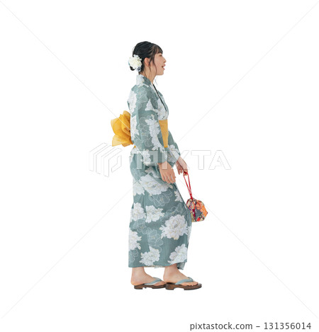 A teenage girl wearing a yukata walking. A transparent, hand-cut, full-body PNG photo. 131356014