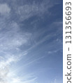 Clear blue sky and soft clouds 131356693