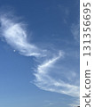 Daytime moon and cirrus clouds 131356695